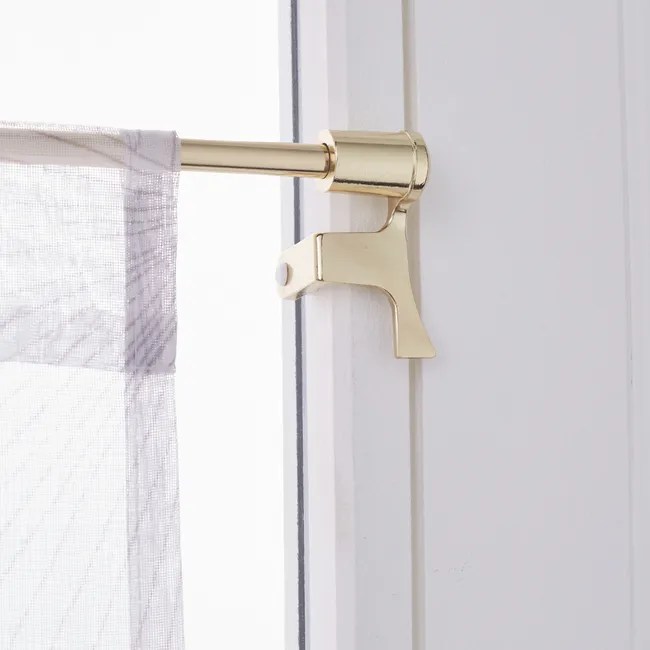  La tringle de vitrage